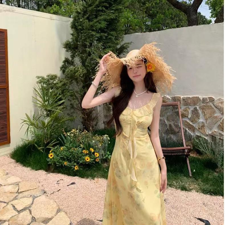 2026 summer French vacation ruffled small fly sleeve cream yellow print V-neck spaghetti waist-cinching fairy dress