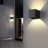 LED Outdoor Four-Leaf Clover Wall Light - Up and Down Beam Decoration for Garden and Exterior Walls.