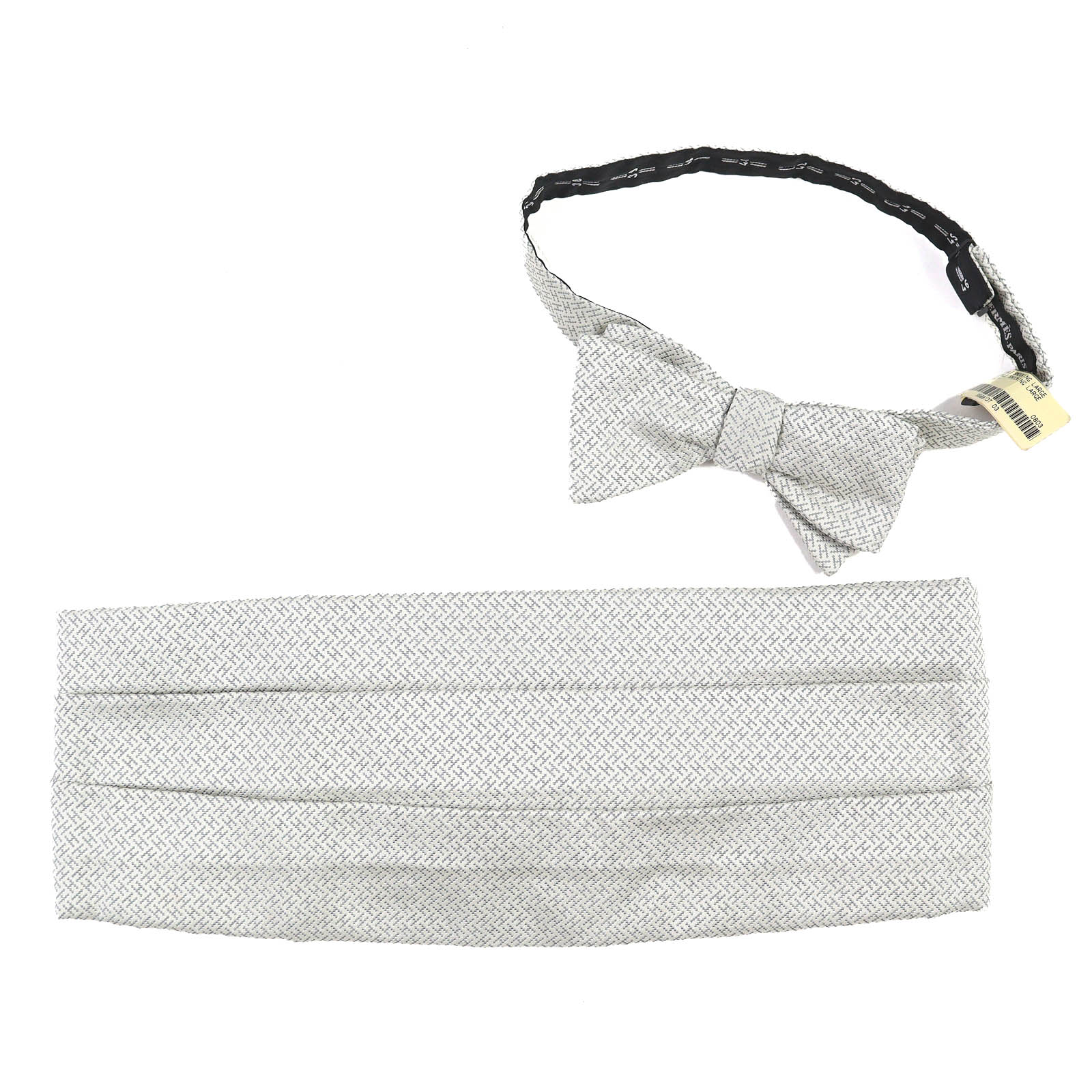 

Безупречный комплект кушака и галстука-бабочки HERMES с мотивом H, светло-серый шелк, б/у