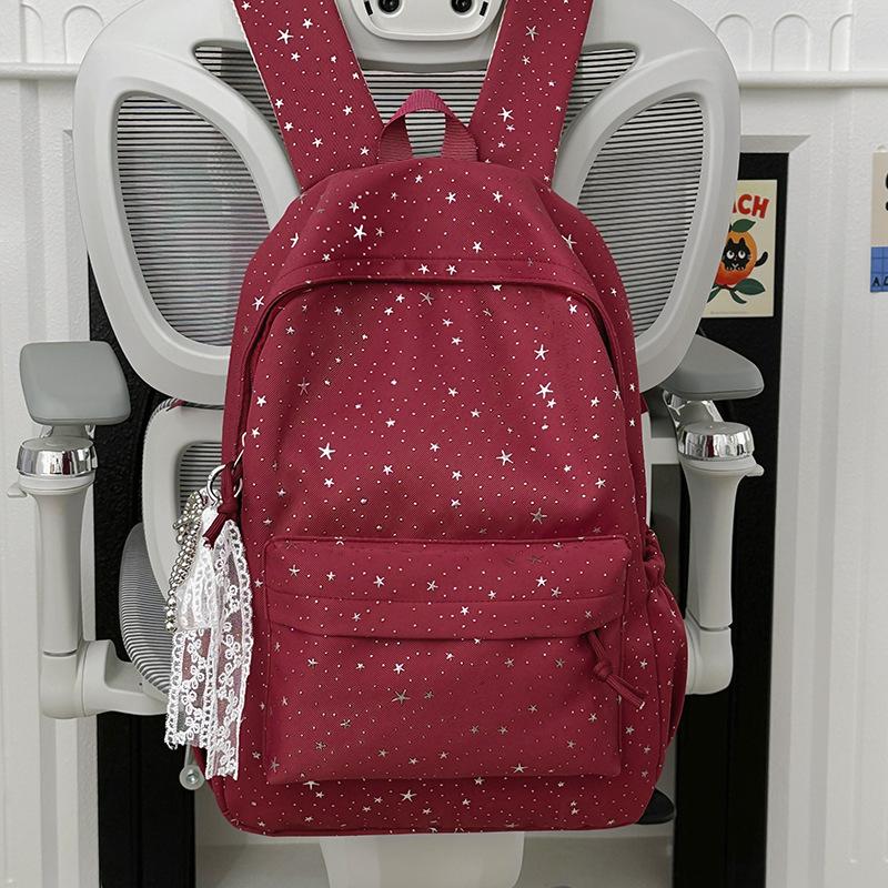 Schoolbag schoolbag new 1011 hot stamping three-dimensional star printing high school students large capacity fresh and sweet casual backpack