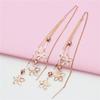Exquisite Russian Purple Gold Tassel Hollow Flower Earline Women'S Fashion Temperament Wind Advanced Sense Rose Gold Plated Earrings
