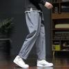 Men Spring Fall Pants with Side Pockets Drawstring Elastic Waist Wide Leg Thin Slacks Solid Color Loose Street Style Sport Trousers for Daily Wear