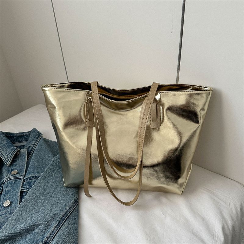 

Premium sense large-capacity bag women s 2025 spring and summer new commuter fashion tote bag versatile portable shoulder bag золотой