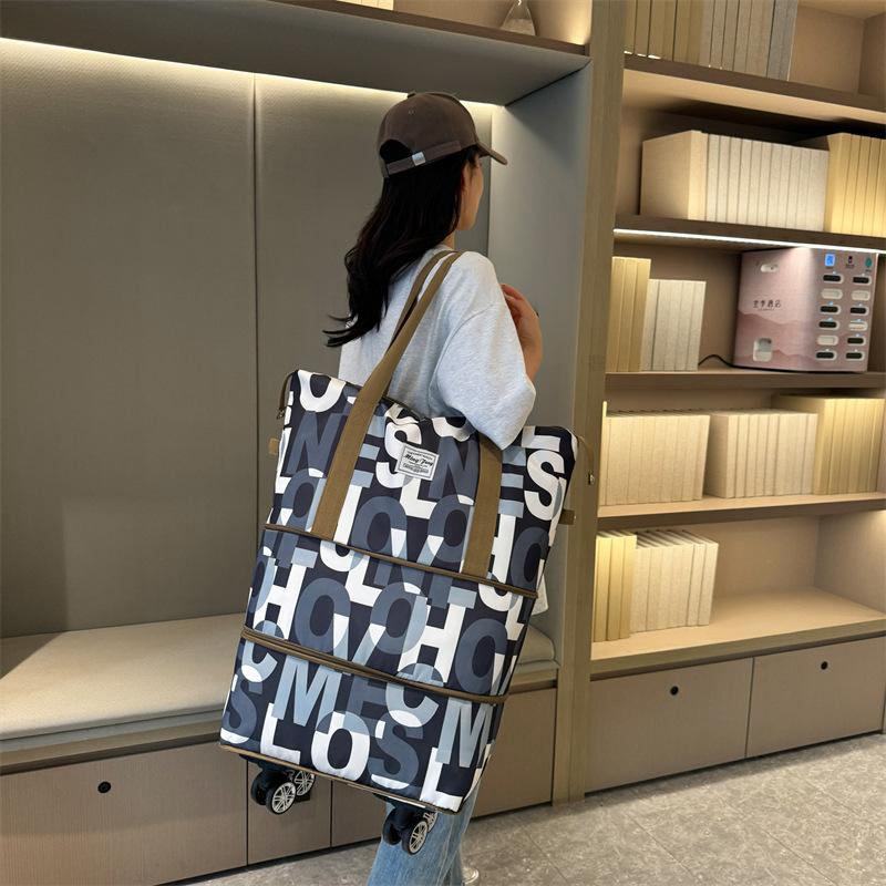 Double-layer expansion with wheels, large-capacity portable travel bag, wet and dry separation, personalized fitness bag can be set with tie rod.