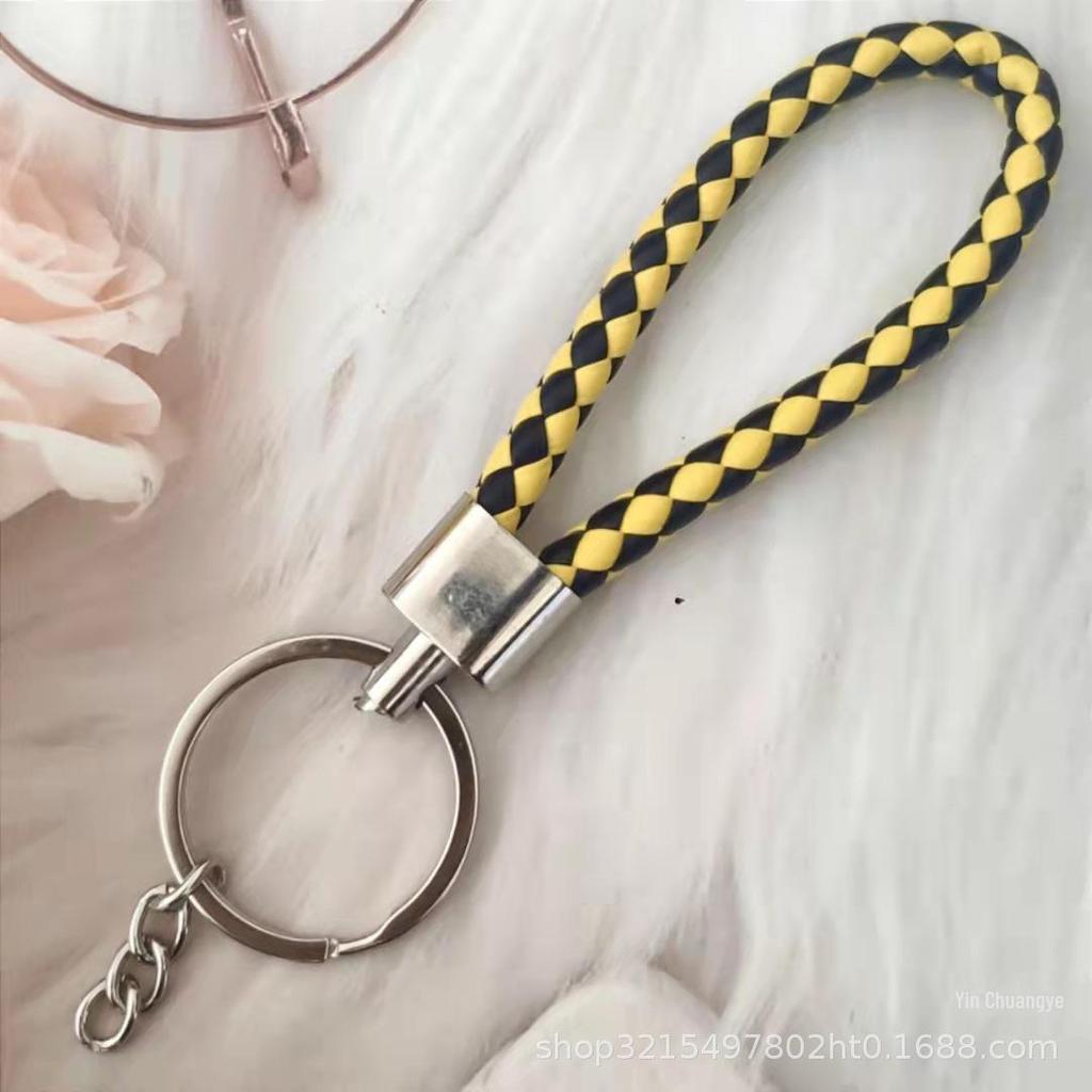 Gevlochten Lederen Touw Sleutelhanger met Poppenhanger - Modieus en Creatief Accessoire