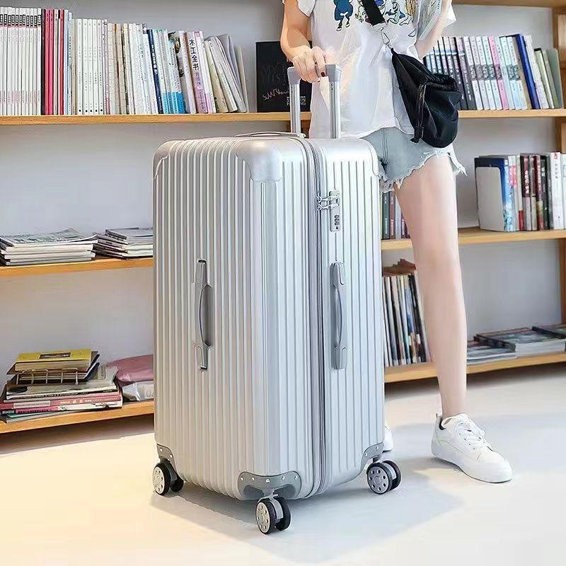 

Extra-Large Durable Rolling Suitcase with Combination Lock - Unisex Travel and Student Friendly 60-inch