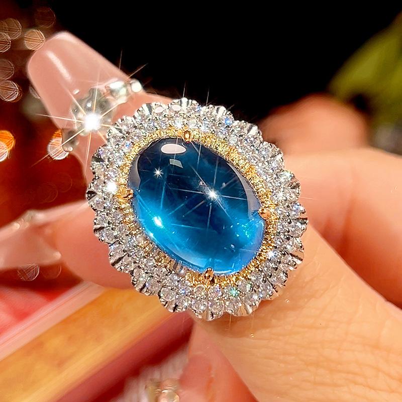 

Ювелирные изделия Имитация Синей Шпинели Ретро Легкая Роскошь Набор Подвеска с Главным Камнем 13 * 18