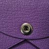 Used 9212 Calvi 7946 Chevre Mysore Goatskin Bag with Gold-stamped Logo and Purple Snap Buttons. Excellent Condition.