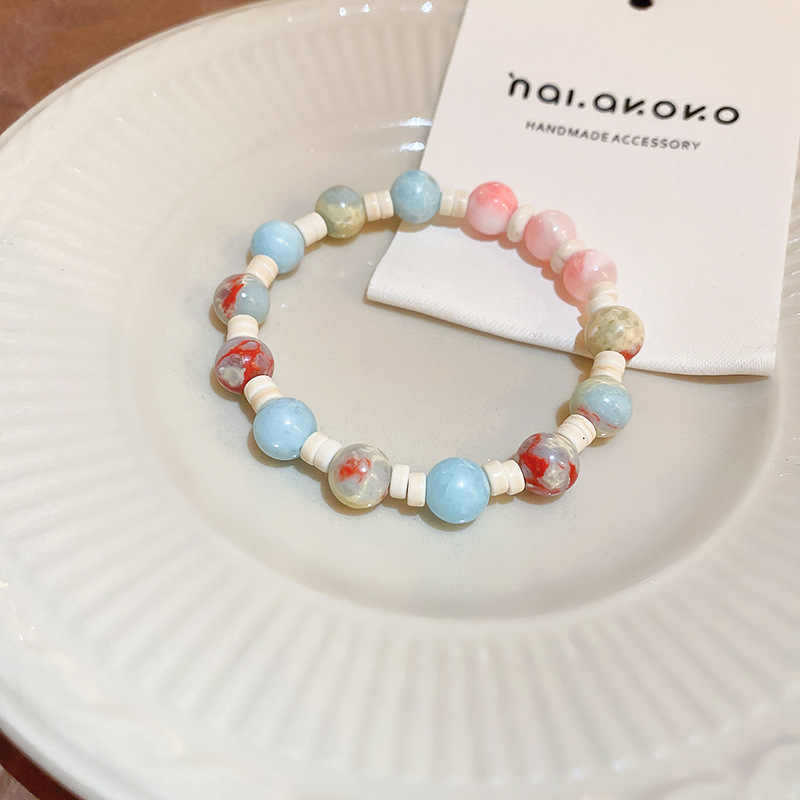 Colored stone rice bead stone elastic bracelet light luxury high-end sense niche design temperament fashionable versatile exquisite jewelry women