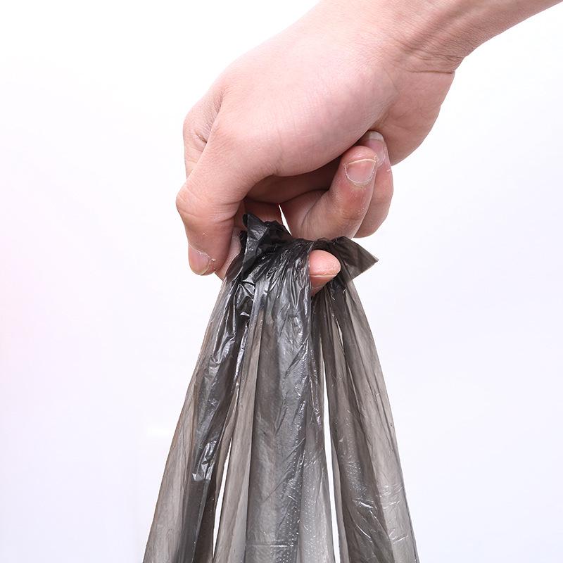 Přenosné černé pytle na odpadky ve stylu vesty, zesílený nový materiál, velká velikost, design s bodovým zlomem pro domácnost.