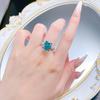 Xiancan Jewelry S925 Silver Oval Paraiba Ice Flower Cut Ring with High Carbon Diamond.