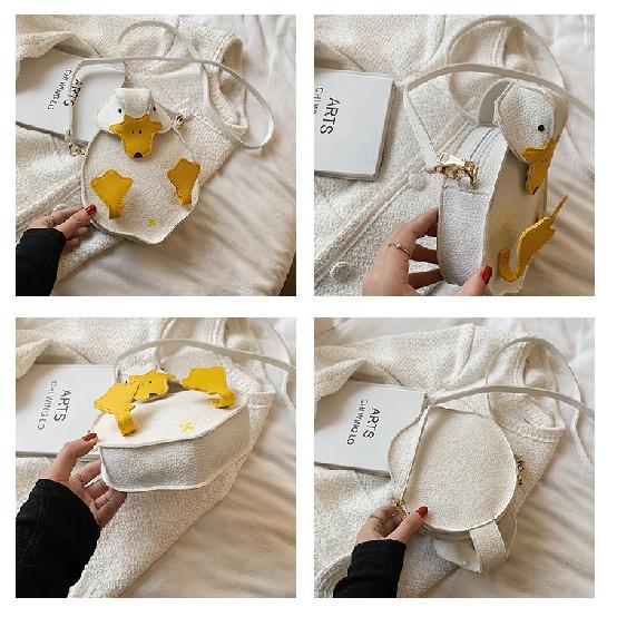 Женская сумка в форме утки контрастного цвета — фото 4