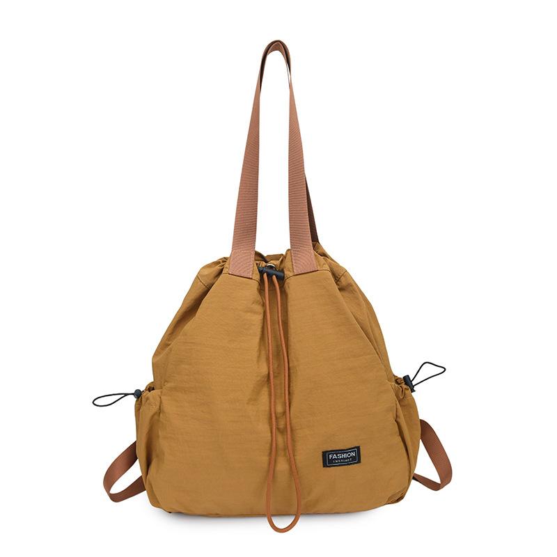 Schoolbag Large Capacity Drawstring Backpack Women's 1011 New Travel Outdoor Handheld Shoulder Bag Lazy Wind Tote Bag