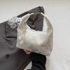 Handheld shoulder bag women's spring and summer new dumpling bag high-end commuter messenger bag