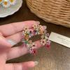 Set med örhängen och halsband i rostfritt stål med diamantblomma - Fräscht, Sött och Lyxigt.