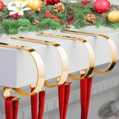 Metall-Nikolausstiefelhalter für den Kamin Für das Kaminsims Entworfen, um Kratzer oder Beschädigungen zu vermeiden, während schwere Stiefel gestützt werden