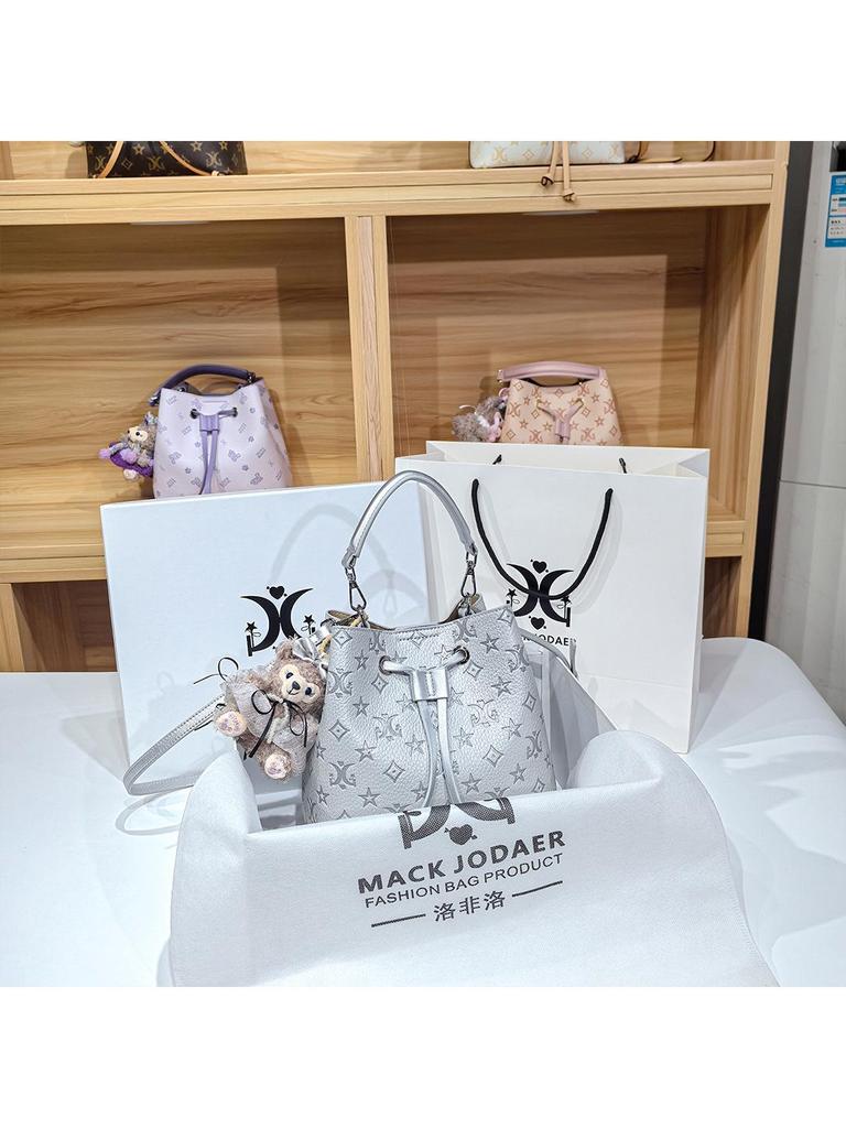 Women's Large Capacity Single Shoulder Bucket Bag with Inner Lining, Compartment Organizer, and Zippered Middle Section.