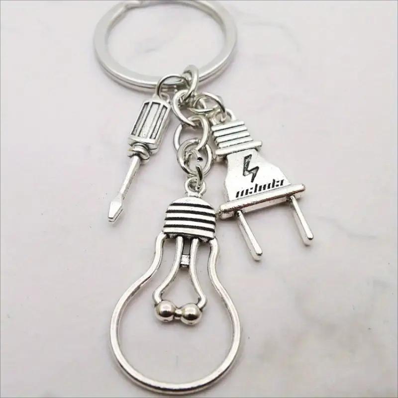 

Modern Minimalist Keychain With Screwdriver Bulb And Plug For Gift Giving