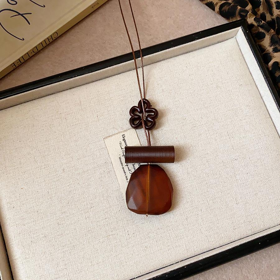 Retro Ethnic Heart Necklace: Wooden Flower Pendant Sweater Chain for Women