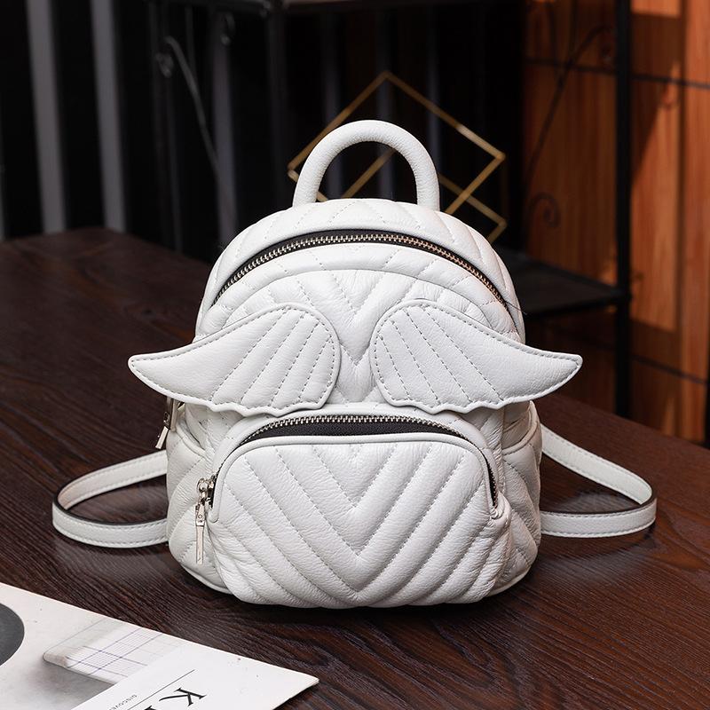 

Cute Wings women Backpack small Wide Strap Lady Shoulder Bags Girl Backpacks Travel Daypack Soft PU Leather bagpack white bolsa 20cmX21cmX10.5cm белый