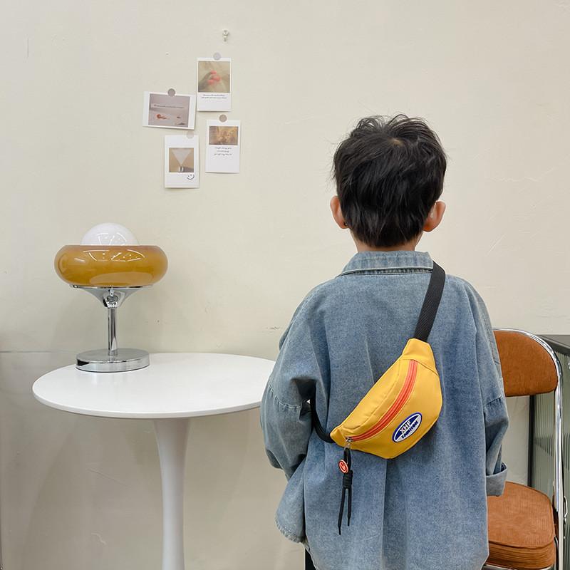 Stylish Kids Sling Bag For Boys And Girls Cool Letter Design Fashionable Crossbody Accessory In Nylon With Durable Features And Fun Colors