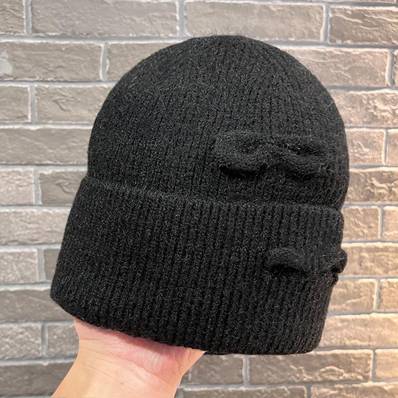 Korean version of fashion hole knitted wool hat men and women autumn and winter outdoor warm bag head cold hat lazy knitted hat