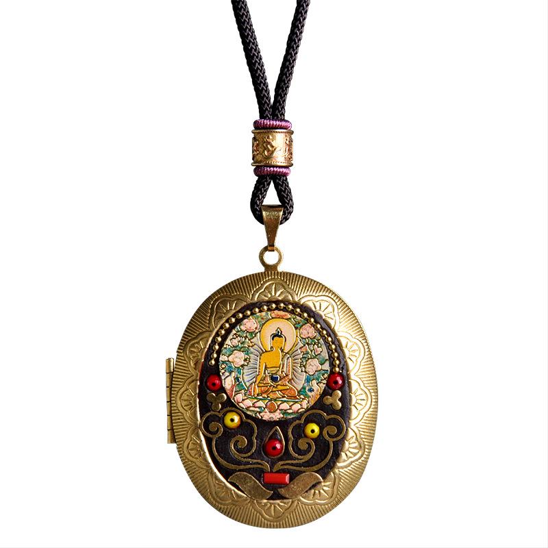 Vairochana Yellow Tibetan Amulet: Brass Box Pendant Necklace with Jambhala & Avalokiteshvara Hollow Design