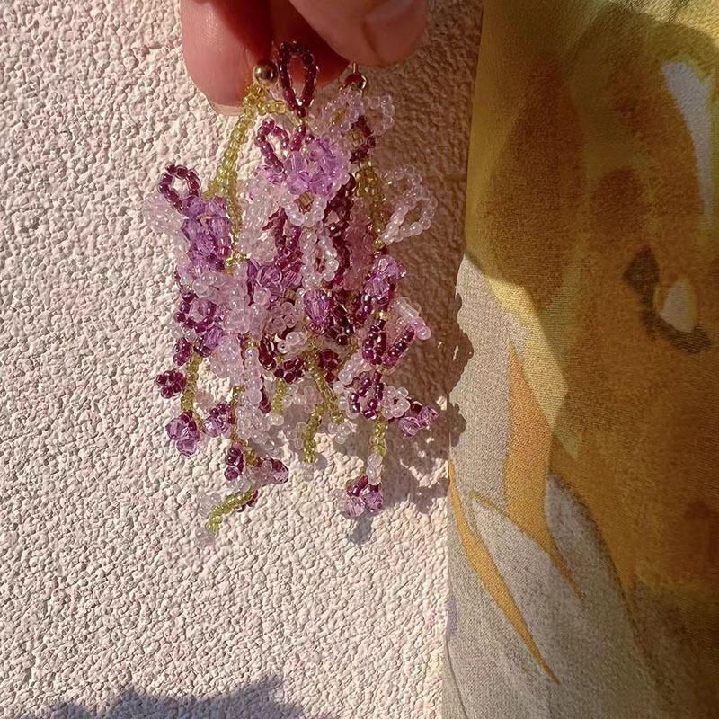 Rice bead glass bead grape fringed earrings fashionable long stud earrings light luxury high-end new earrings