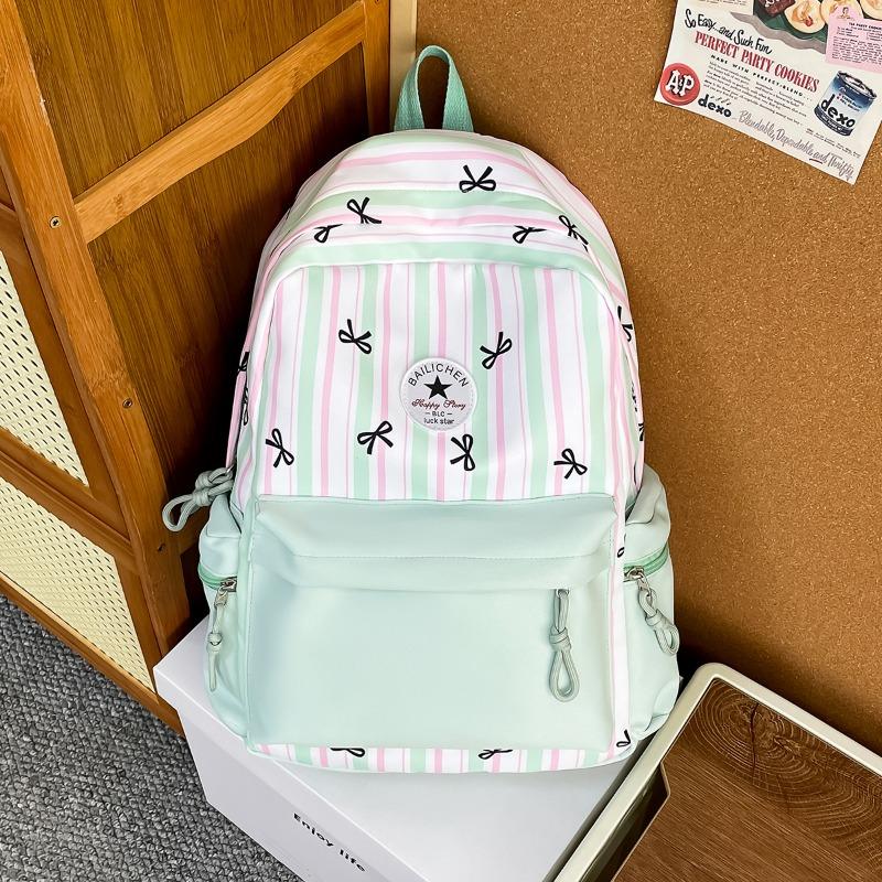 New high-value, fresh and sweet bow striped backpack, color contrast and lightweight backpack for junior high school students