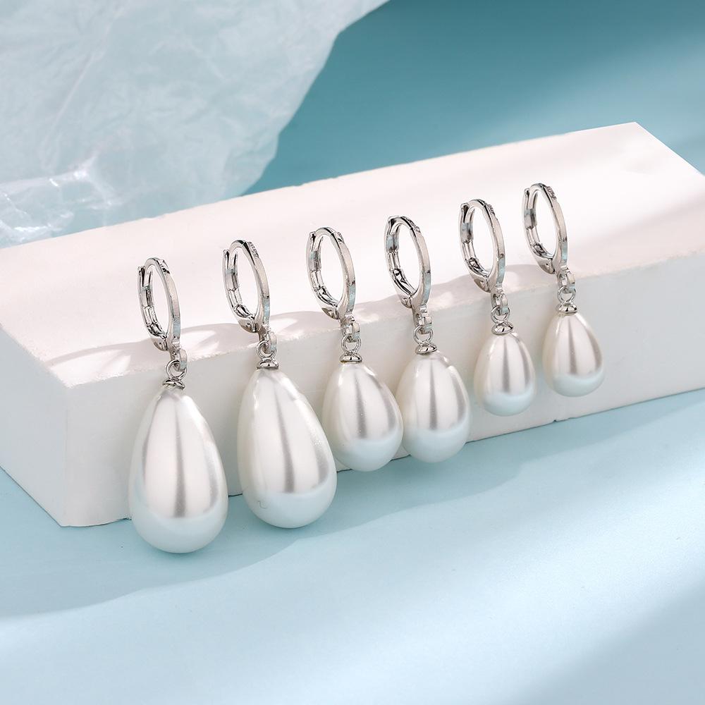 Boucles d'oreilles rétro goutte d'eau perle style cour tempérament doux tendance toute l'année boucles d'oreilles perles blanches de célébrité