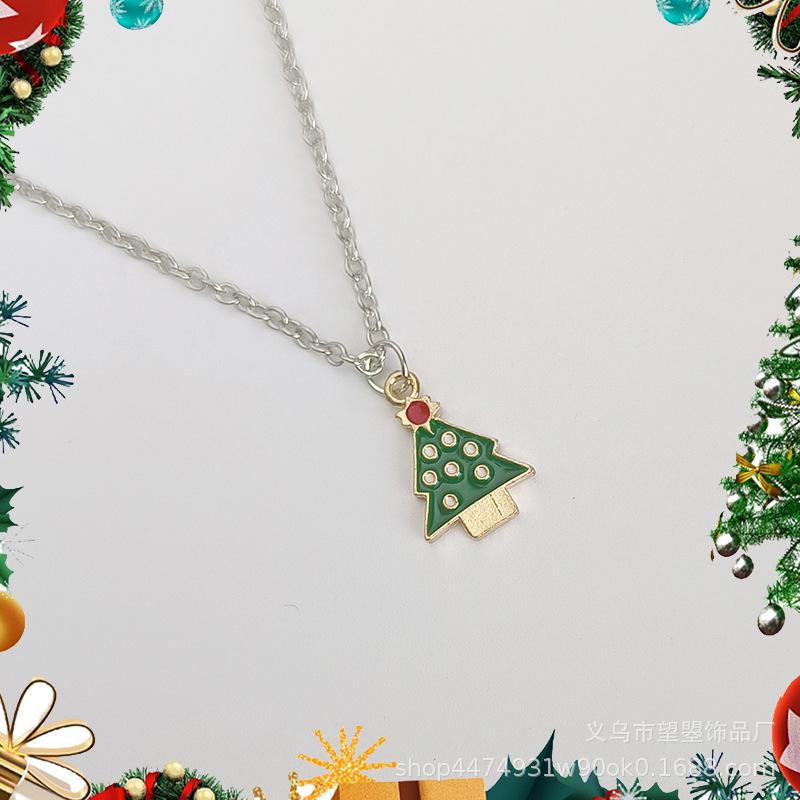 

Christmas Necklace with Bells, Snowflakes, Snowmen, Santa Claus, Reindeer, Candy Cane, and Christmas Tree Alloy Pendants
