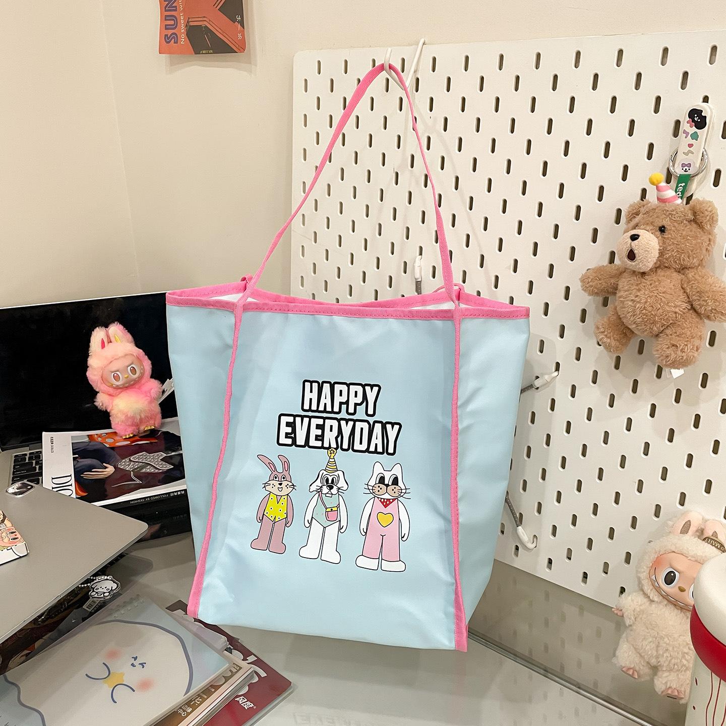 New canvas bag wind versatile shoulder bag large capacity cartoon nylon double-sided back canvas commuter tote bag 281834 синий 2285₽