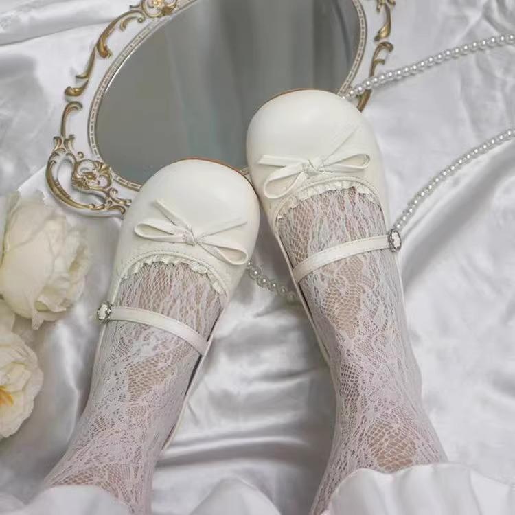 2025 new French retro white round head bow flat-soled single shoes women's spring one-pedal soft-soled beanie shoes