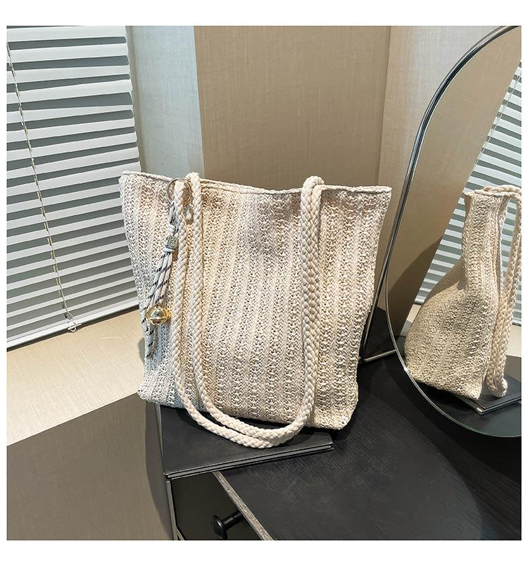 Halm stor kapacitet mode mamma och barnväska vår och sommar ny avslappnad flätad trend enkel axel bärbar toteväska