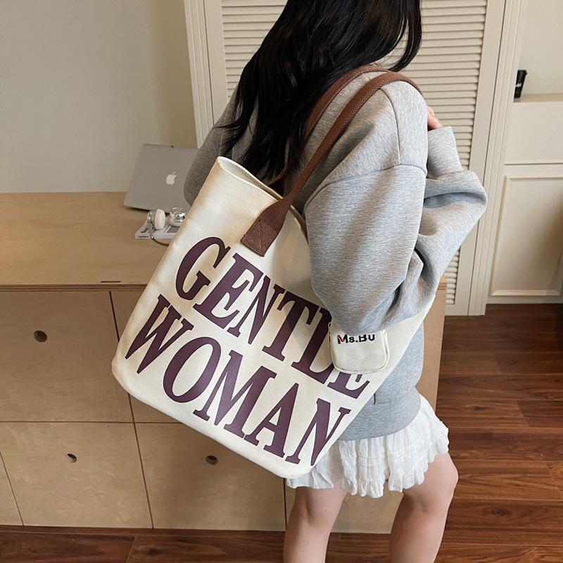2025 autumn new fashion simple commuter large capacity shoulder bag Korean version casual canvas bag alphabet tote bag