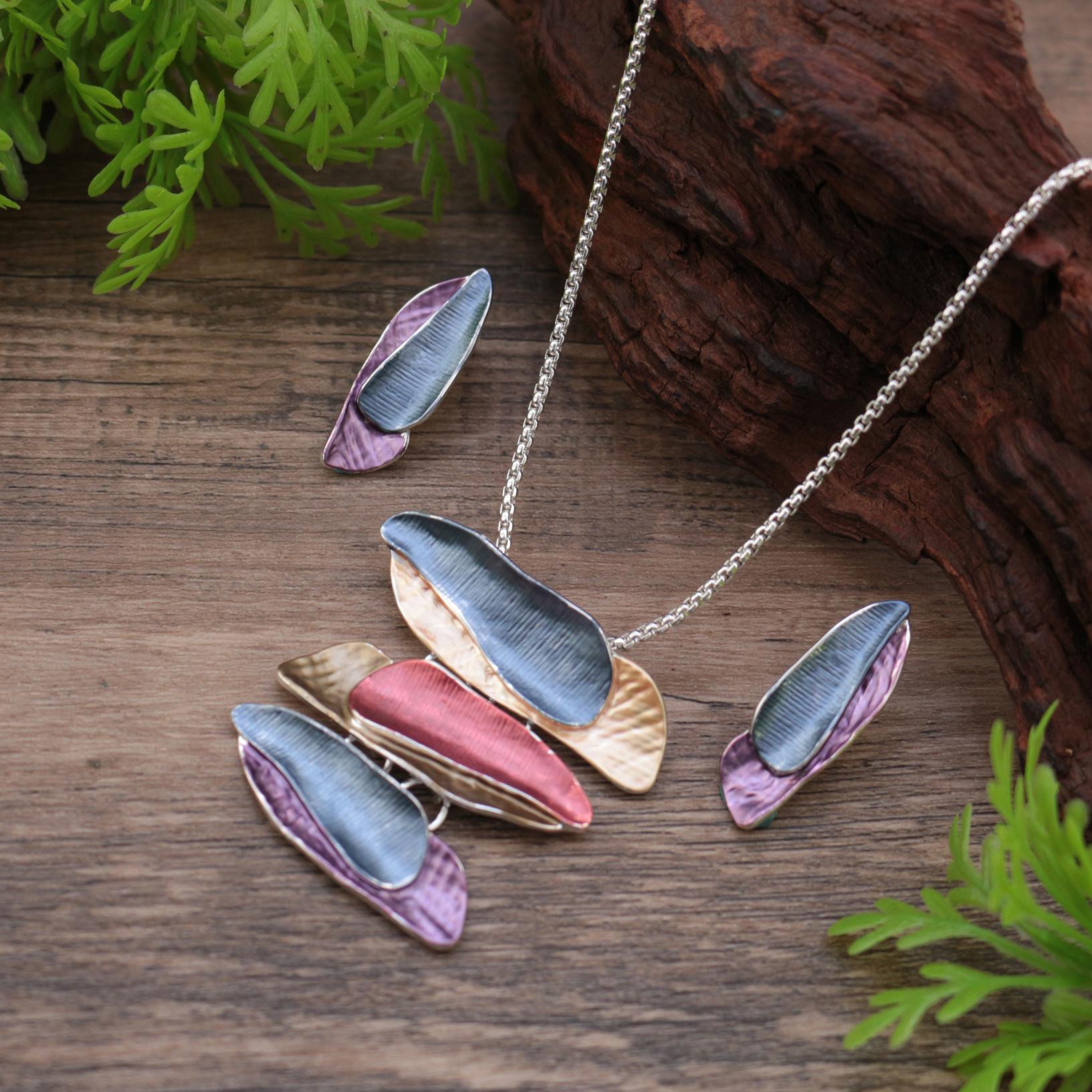 

New enamel exaggerated geometric petal stud earrings pendant set, women s high-end geometric necklace