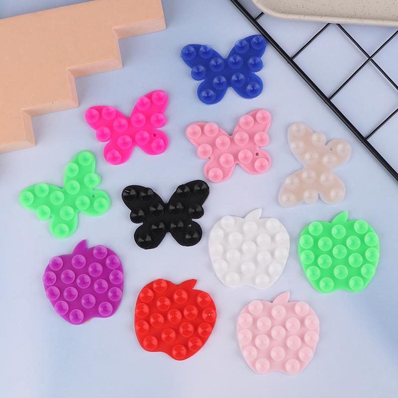 1 szt. Silikonowa podkładka w kształcie motyla do mocowania telefonu komórkowego, przyssawka z tyłu, samoprzylepna, silikonowa, stała przyssawka