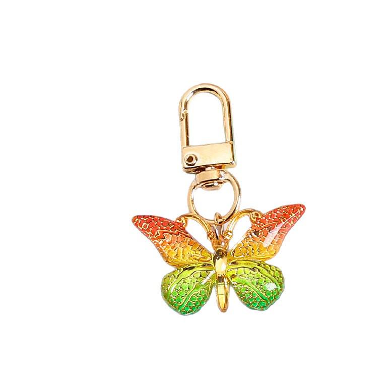 Gradient Butterfly Pendant: Iridescent Keychain Charm for Backpack or Earphone Case.