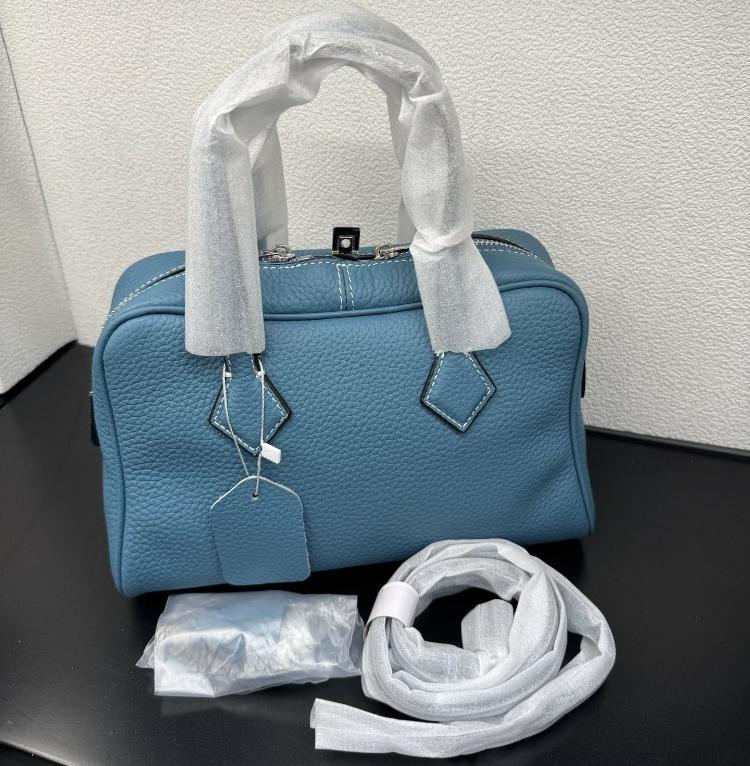 

Того Сумка-тоут из коровьей кожи высшего слоя Женская 2025 Новый стиль Высококлассная текстура Ручная Прозрачная Одинарная Кожа Сохранность Шара Сумка-портфель 25×11×16cm темно-синий