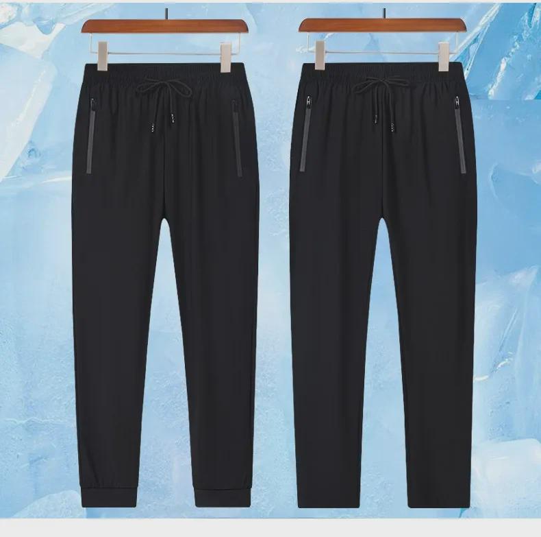 Herrenhose aus Eisseide mit elastischem Bund und Reißverschluss – einfarbig, lässig, sportlich, Neun-Punkt-Länge, Sommerkleidung.