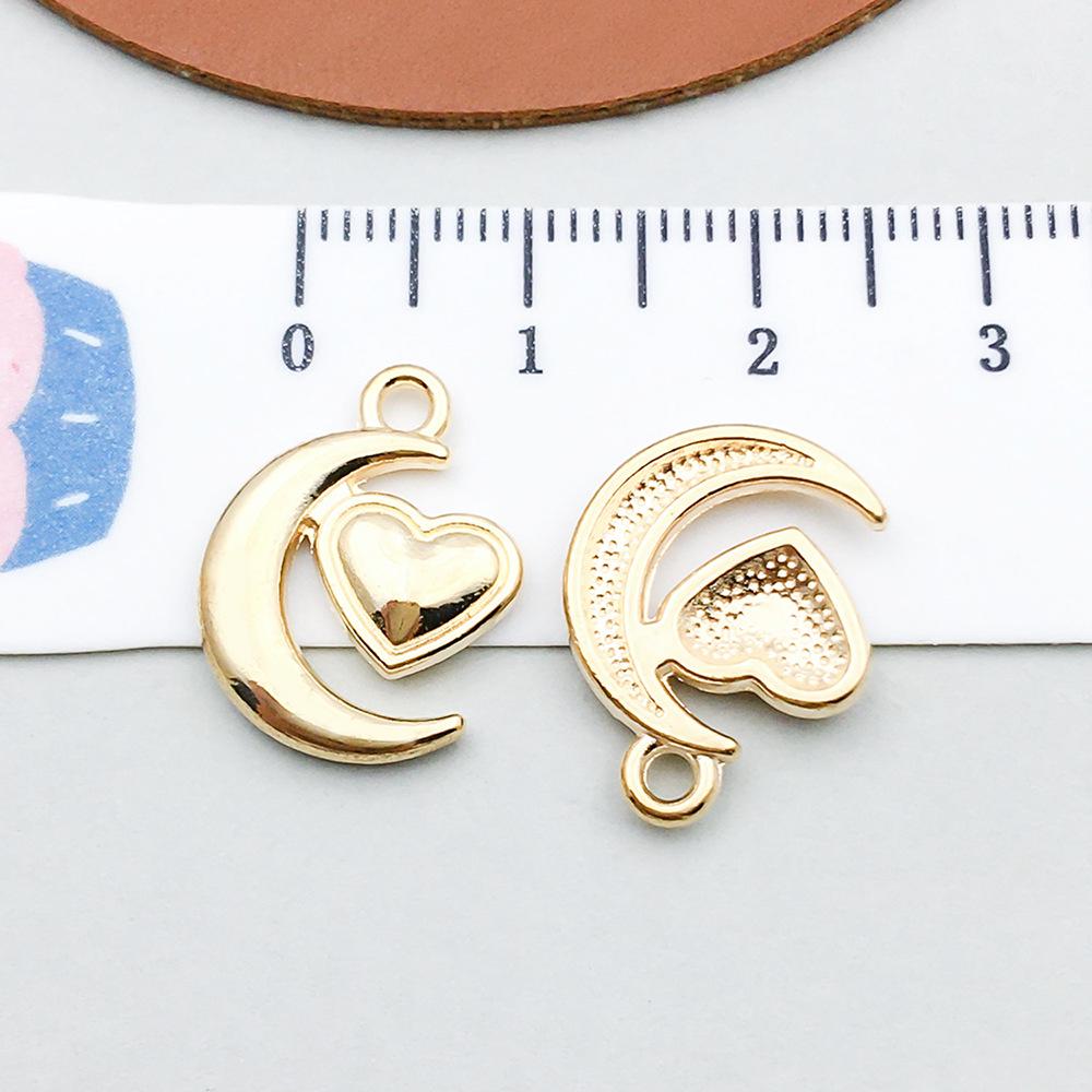 100-Piece Five-Color Alloy Sun, Moon, and Star Pendant Charms for DIY Jewelry