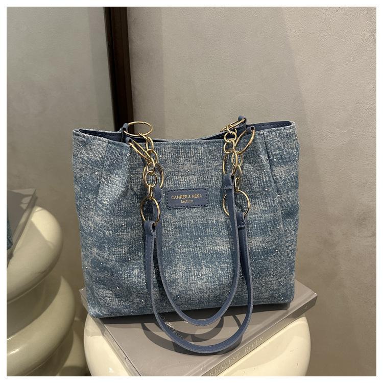 

Large capacity fashion simple temperament handbag 2025 autumn and winter new versatile ins shoulder underarm tote bag світло-синій колір