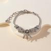 Adjustable Beaded Bracelet with Angel Wing Pendant Five Point Star Accent and Glue Rhinestone Embellishment
