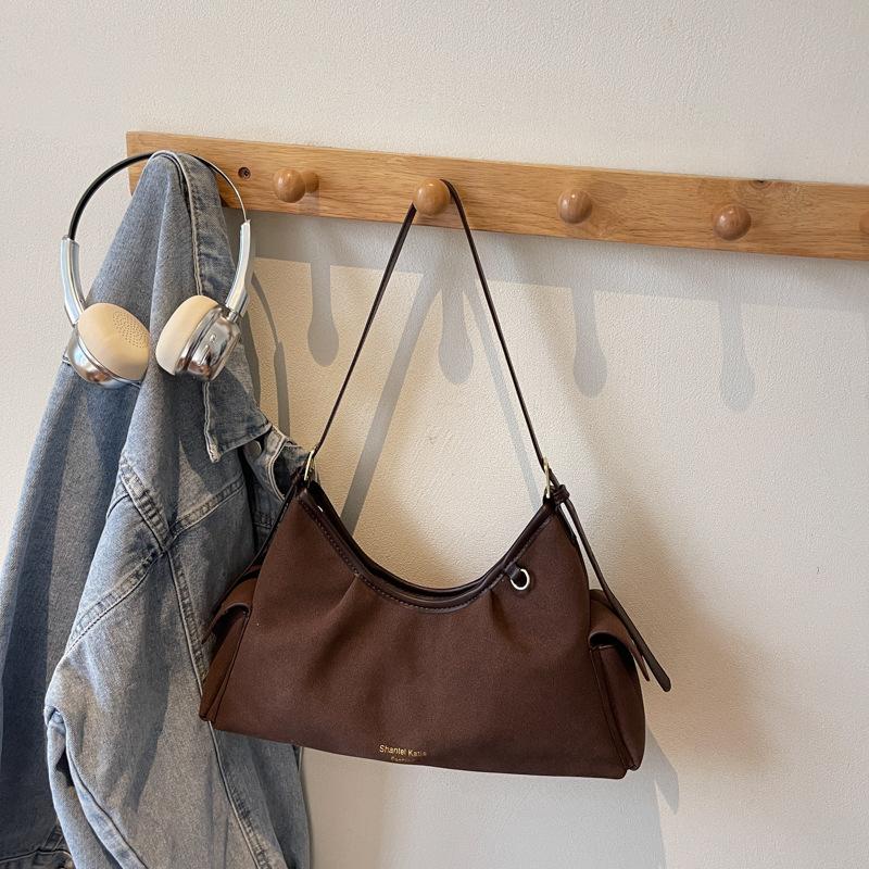 

Korean version of niche casual portable dumpling bag women s 2025 autumn new high-value foreign-style shoulder messenger bag