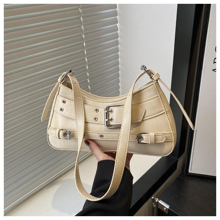 

2025 простой заклепочный модный весенний новый тренд иностранный дизайн личности на плечо кроссбоди подмышечная сумка женщина хаки