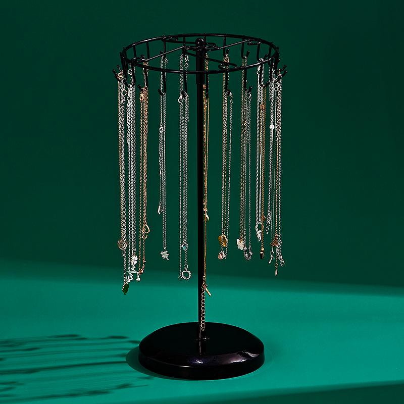 

Rotating Jewelry Display Stand: 23-Hook Wrought Iron Rack for Necklaces and Bracelets, Detachable Board for Market Stall.