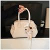 Spring solid color handbag new fashion versatile shoulder messenger bag niche design novel shell bag
