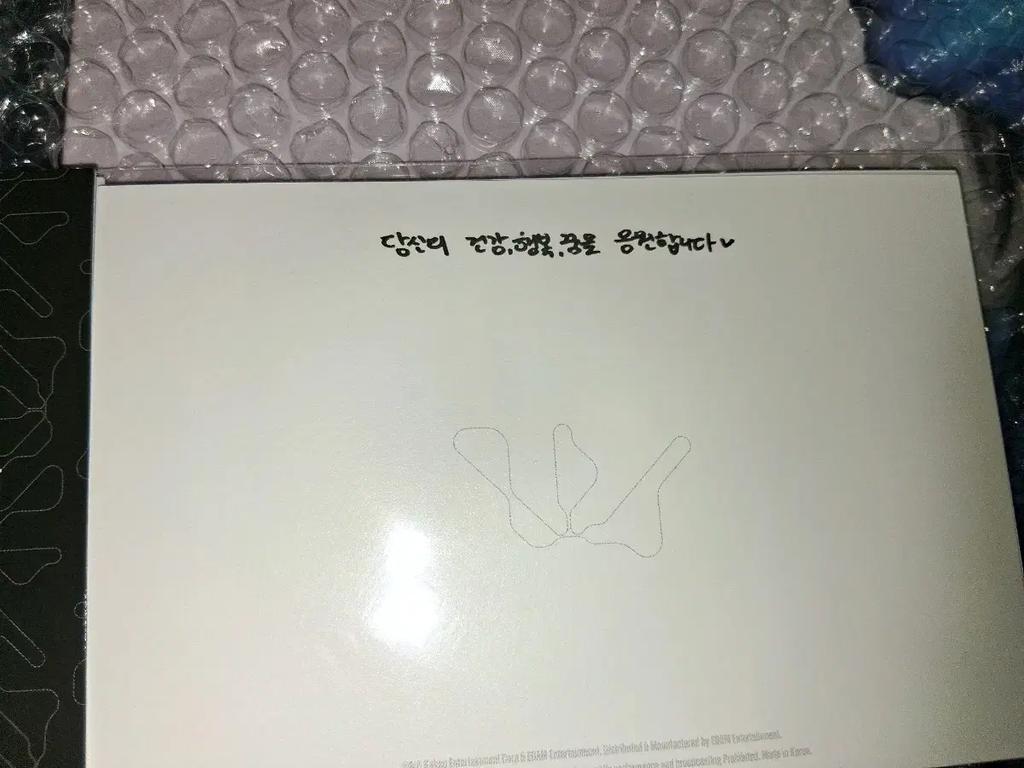 Woodz Cho Seung-yeon LP, neotevřené, zapečetěné, s bonusovými předměty.