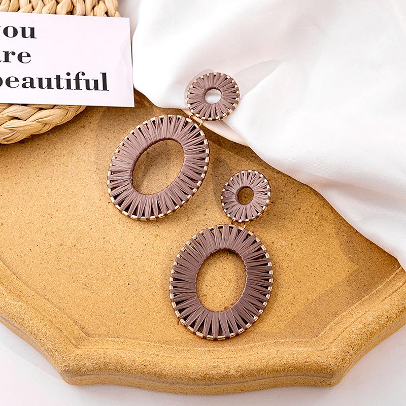 Exaggerated Oval Leather Dangle Earrings: Colorful, Hollow, Holiday Style