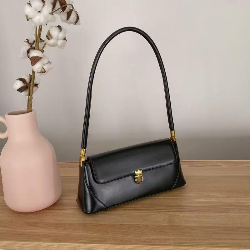 Women's Fashion Versatile French Underarm Bag - High-End, Simple, Niche Design, Hand-Held, Single Shoulder Handbag.